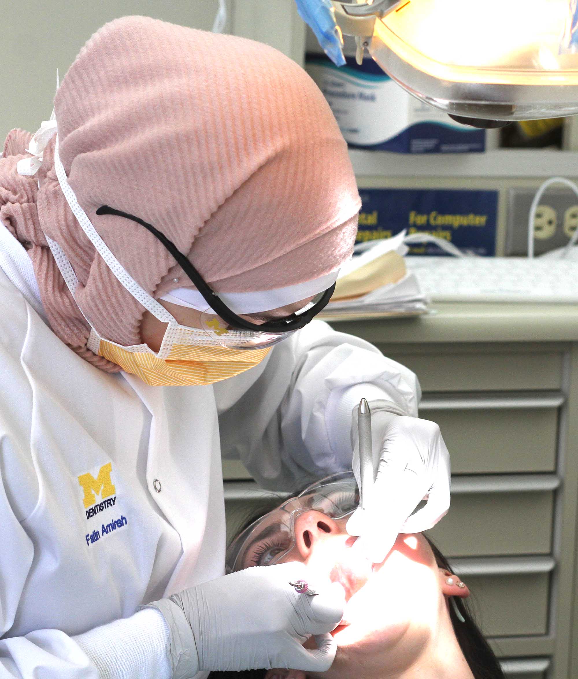 dental hygiene student working